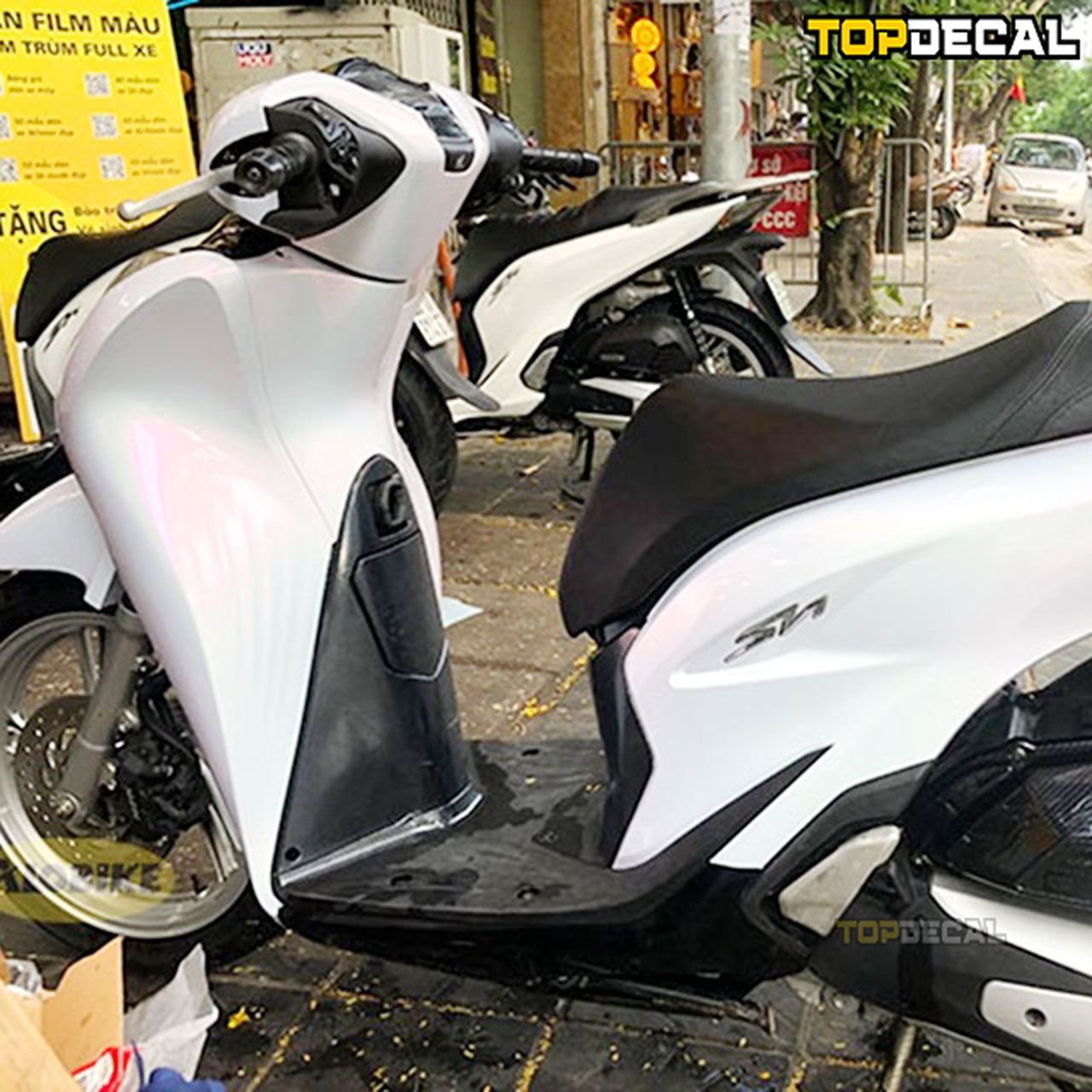 dán xe sh màu trắng